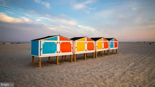 a view of a lake with a table and chairs