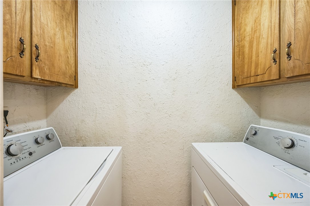 127 Jordan Loop Nolanville, TX 76559 - Photo 15 of 18 a utility room with dryer and washer