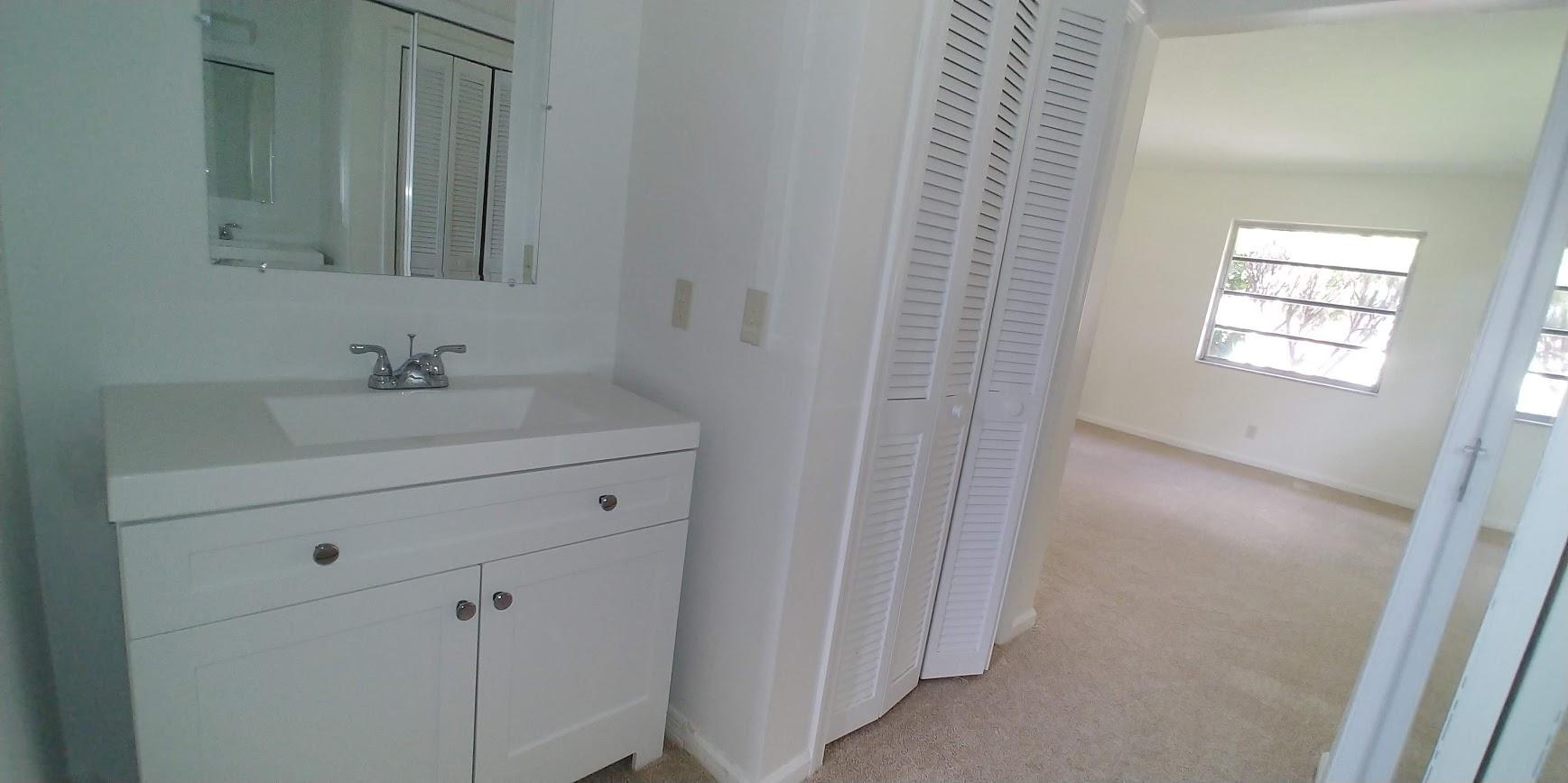 354 Northwest 42nd Street Boca Raton, FL 33431 - Photo 20 of 36 Vanity / Master bed
