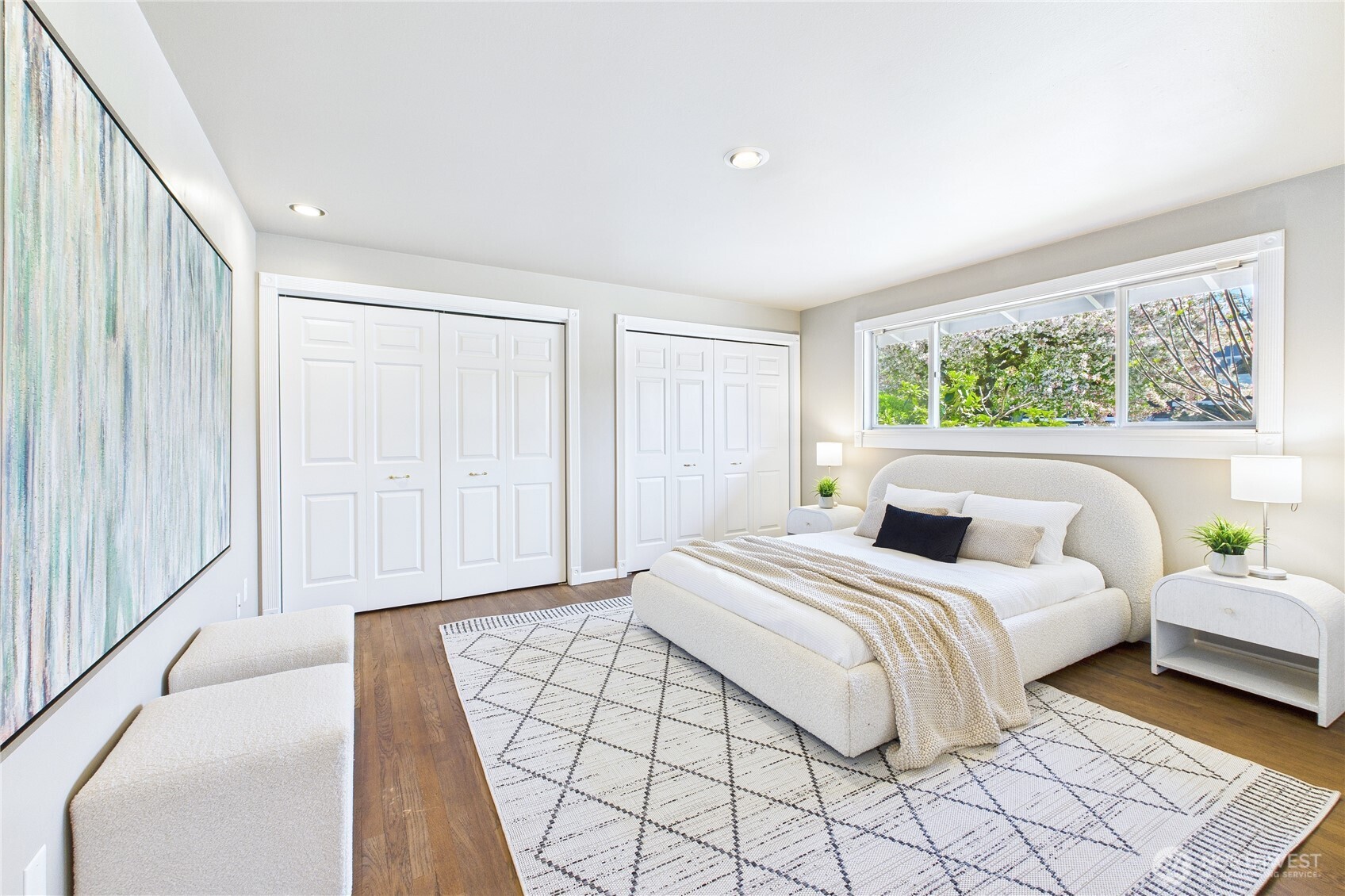 1323 121st Avenue Southeast Bellevue, WA 98005 - Photo 13 of 28 a bedroom with a bed and a large window