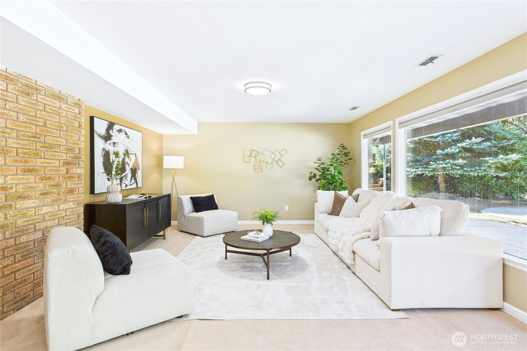1323 121st Avenue Southeast Bellevue, WA 98005 - Photo 19 of 28 a living room with furniture and a large window