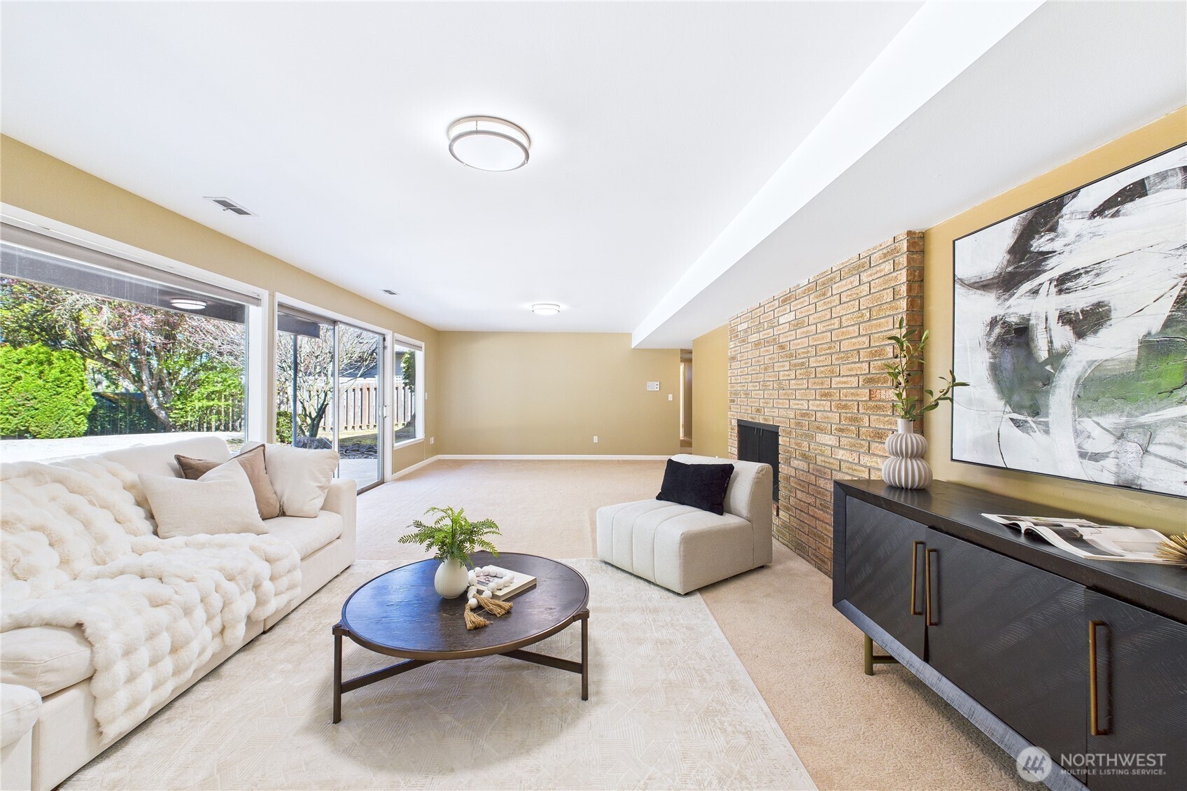 1323 121st Avenue Southeast Bellevue, WA 98005 - Photo 20 of 28 a living room with furniture and a large window