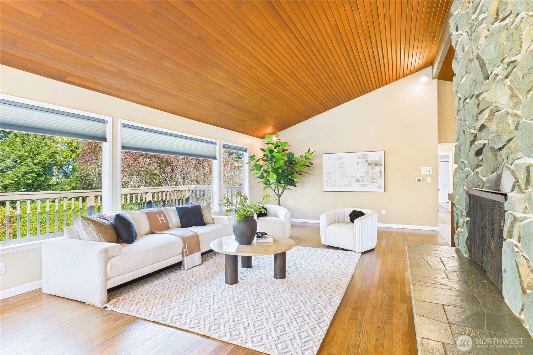 1323 121st Avenue Southeast Bellevue, WA 98005 - Photo 5 of 28 a living room with furniture and a large window