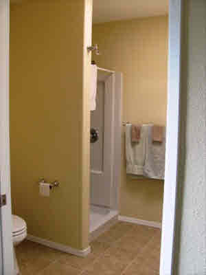11-2998 Kilikaa Road Volcano, HI 96771 - Photo 5 of 13 a bathroom with a granite countertop shower and a toilet