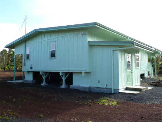 11-2998 Kilikaa Road Volcano, HI 96771 - Photo 10 of 13 a front view of a house with a yard