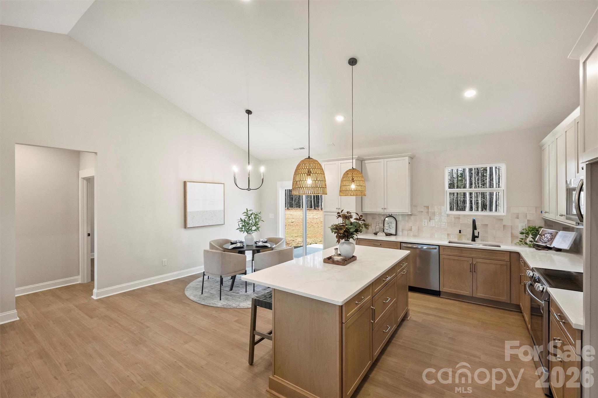 2307 Lee Lawing Road Lincolnton, NC 28092 - Photo 20 of 40 a kitchen with a sink a counter space appliances and a window