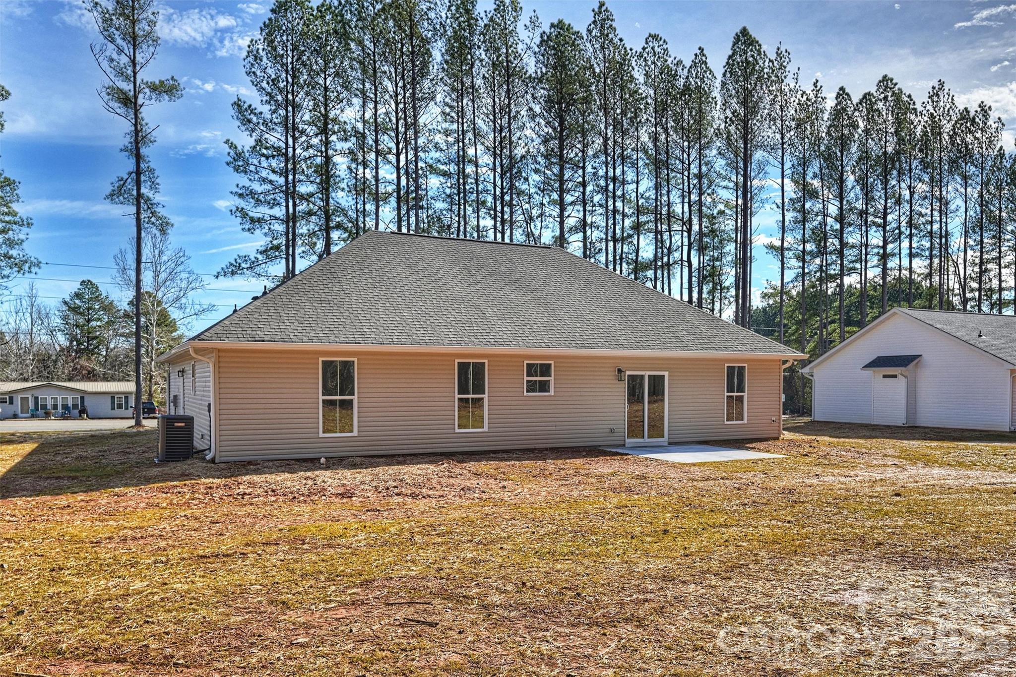 2307 Lee Lawing Road Lincolnton, NC 28092 - Photo 38 of 40 a view of a house with a yard