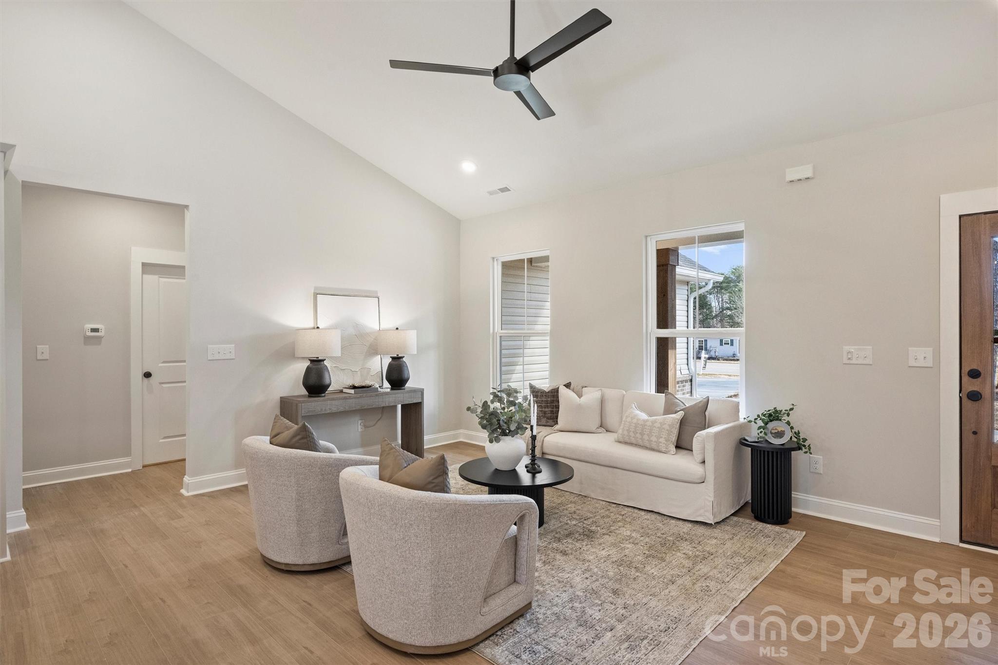 2307 Lee Lawing Road Lincolnton, NC 28092 - Photo 9 of 40 a living room with furniture and a potted plant