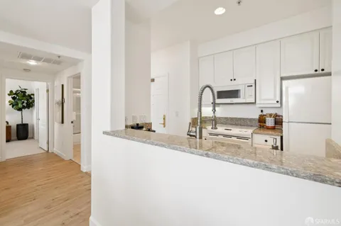 a bathroom with sink and mirror