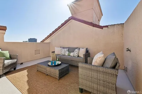 a view of a balcony with city view