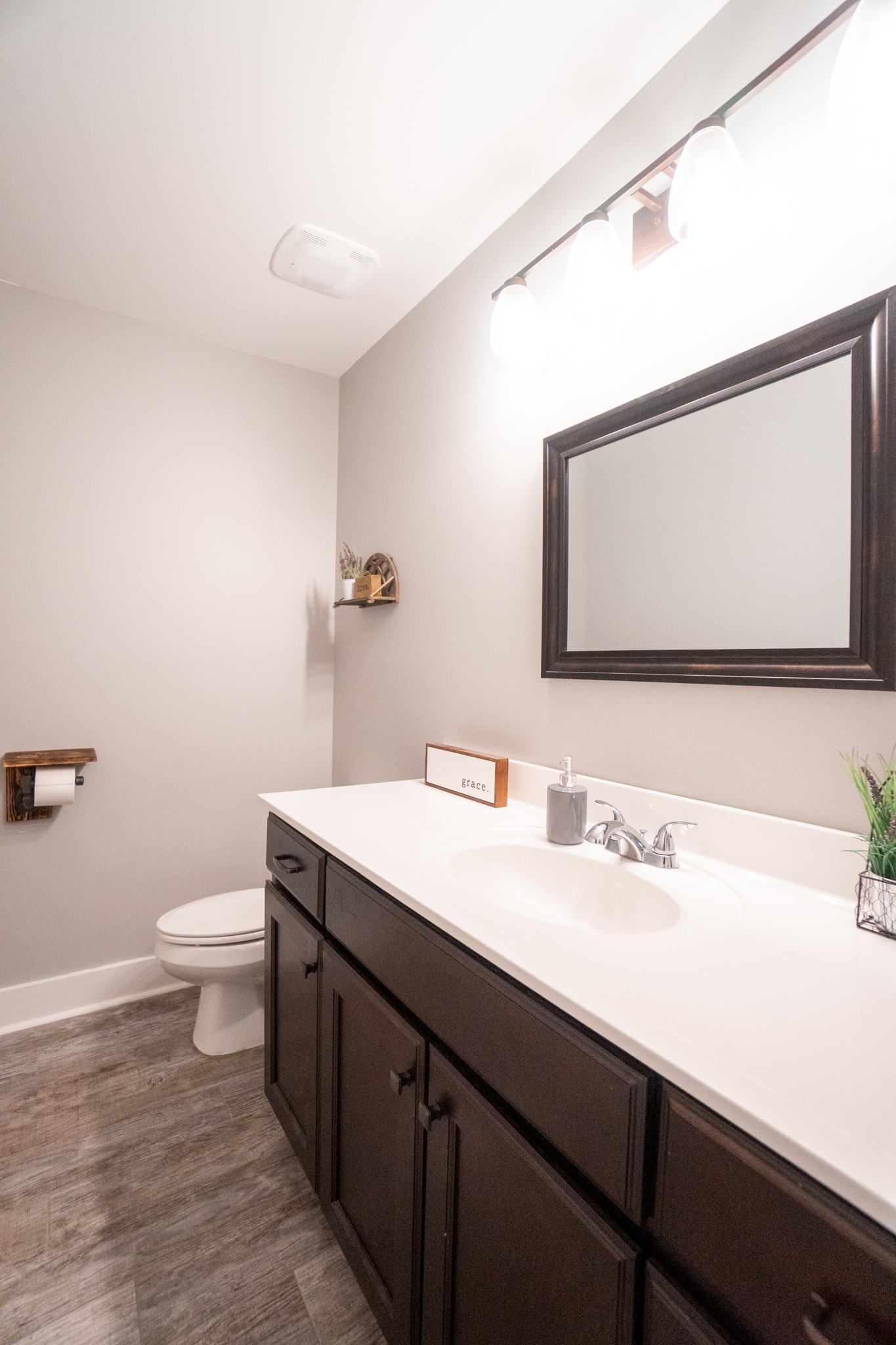 2017 Carpenter Bridge Road Columbia, TN 38401 - Photo 23 of 36 a bathroom with a sink a toilet and mirror