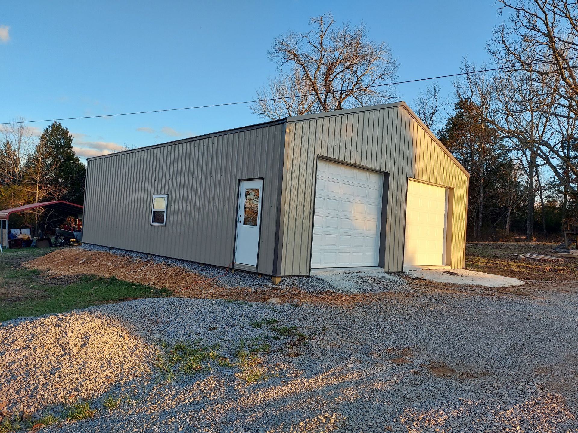 2017 Carpenter Bridge Road Columbia, TN 38401 - Photo 3 of 36 a front view of a house with a yard and garage