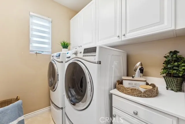 a bedroom with a bed and a table