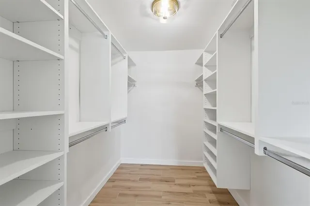 a view of an empty walk in closet