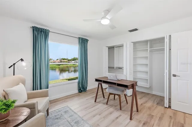 a workspace with furniture and window