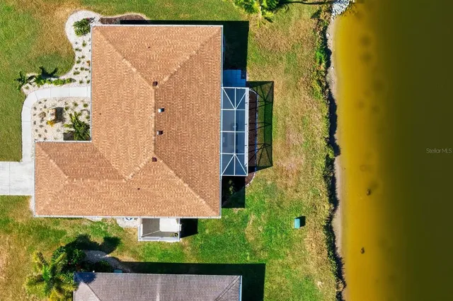 a street sign that is on a wooden wall
