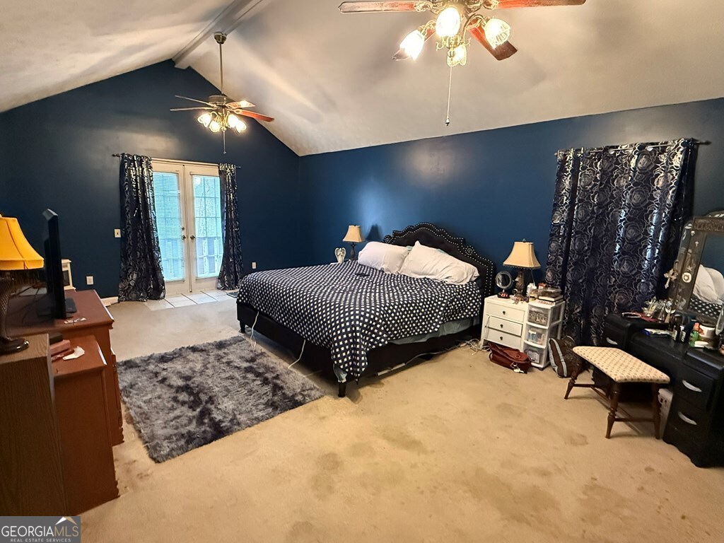1158 Holly Grove Circle Northeast Dalton, GA 30721 - Photo 15 of 20 a bedroom with a bed and lamp chandelier