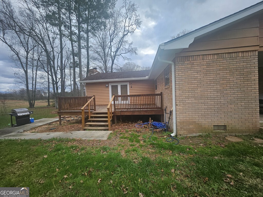 1158 Holly Grove Circle Northeast Dalton, GA 30721 - Photo 4 of 20 a view of a house with a yard and sitting area