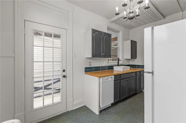 a bathroom with a sink double vanity and a mirror