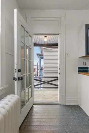 a view of a hallway view with staircase