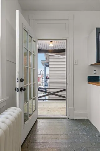 a view of a hallway view with staircase