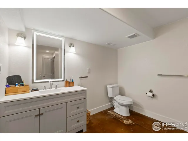 a bathroom with a sink and a toilet