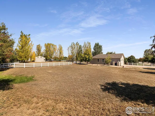 a view of street with houses