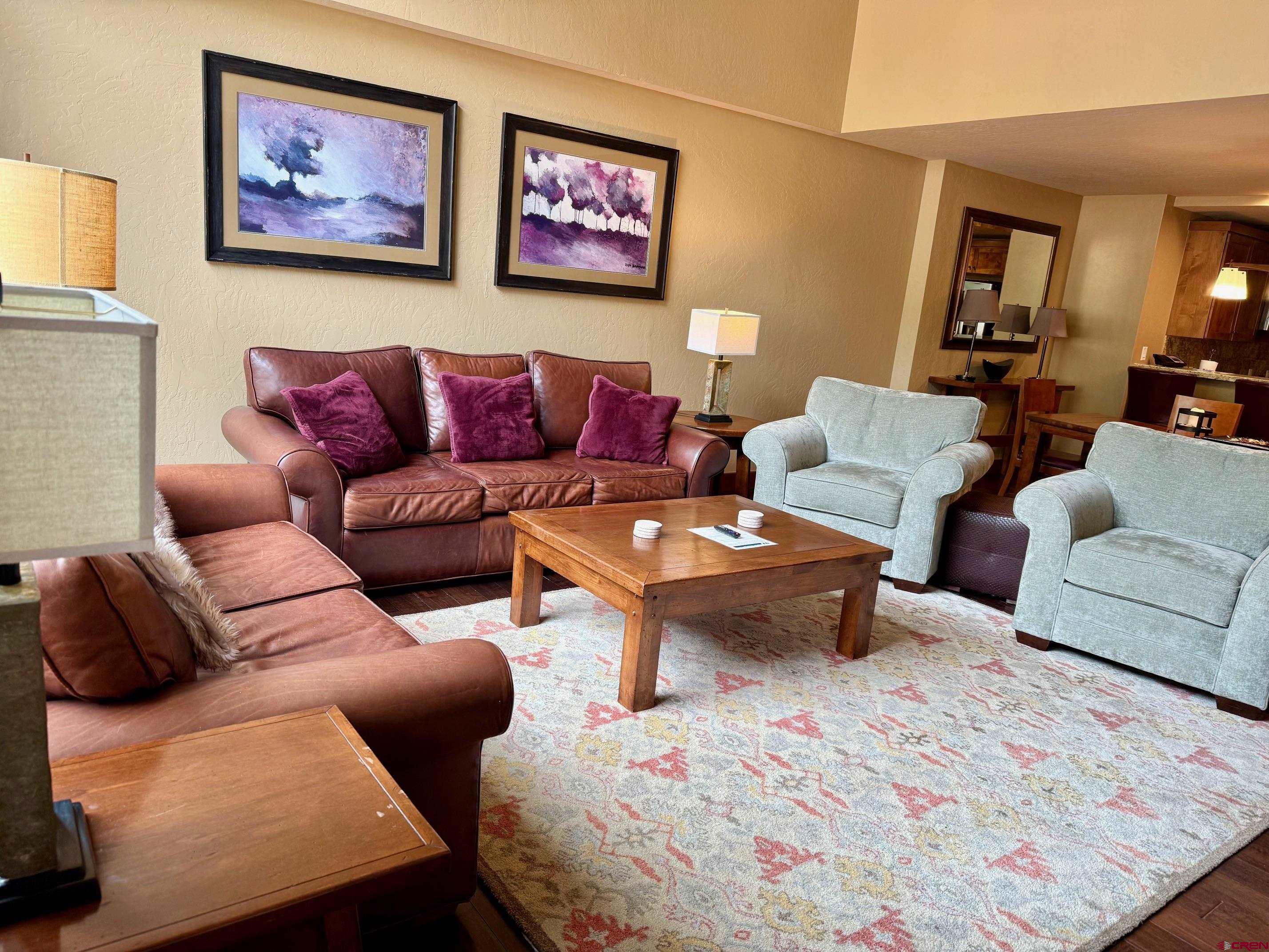 24 Sheol Street, Unit 506 Durango, CO 81301 - Photo 10 of 45 a living room with furniture and a rug