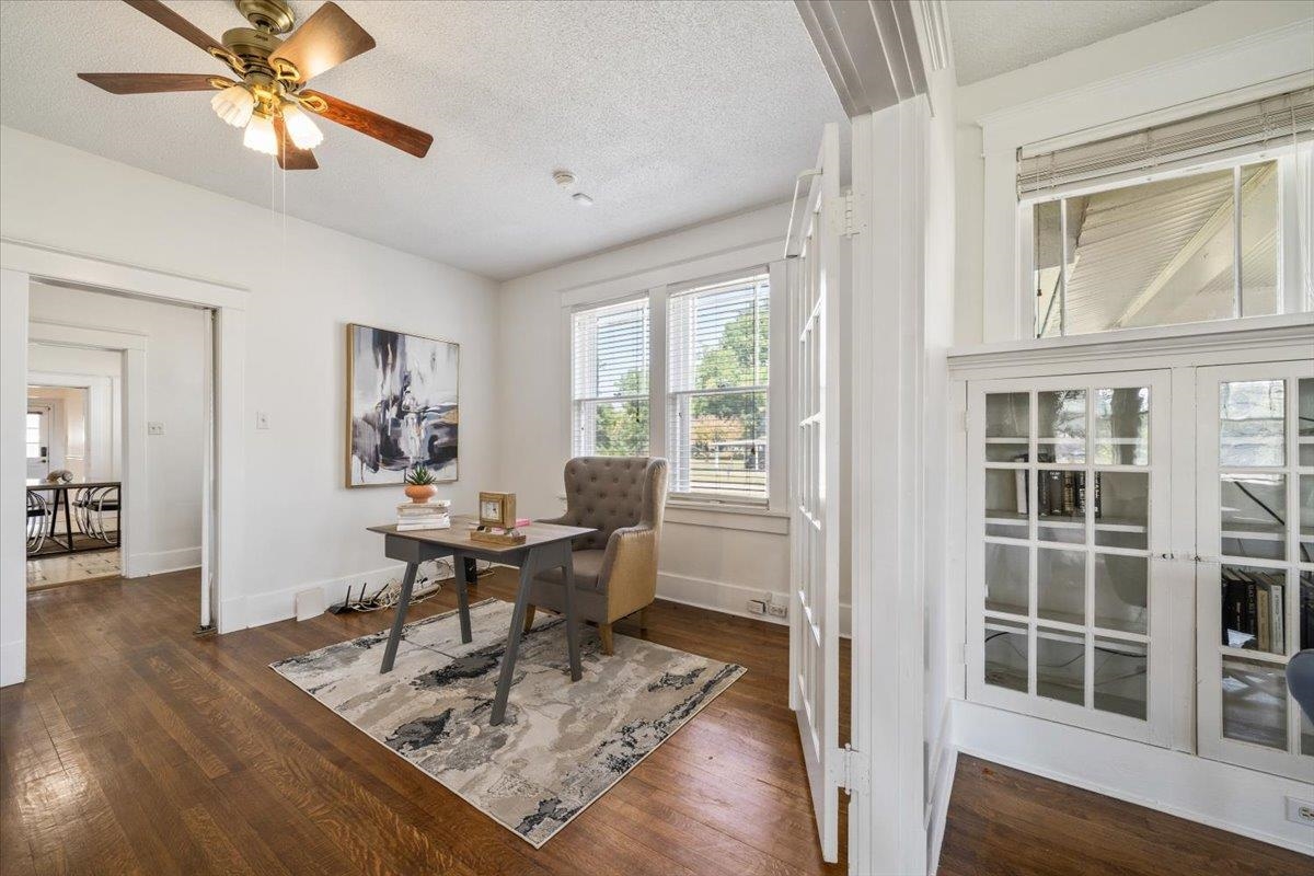 8703 Rosemark Road Millington, TN 38053 - Photo 11 of 38 a work room with furniture wooden floor and a window