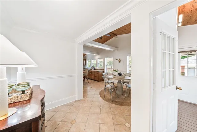 a view of a living room and dining room