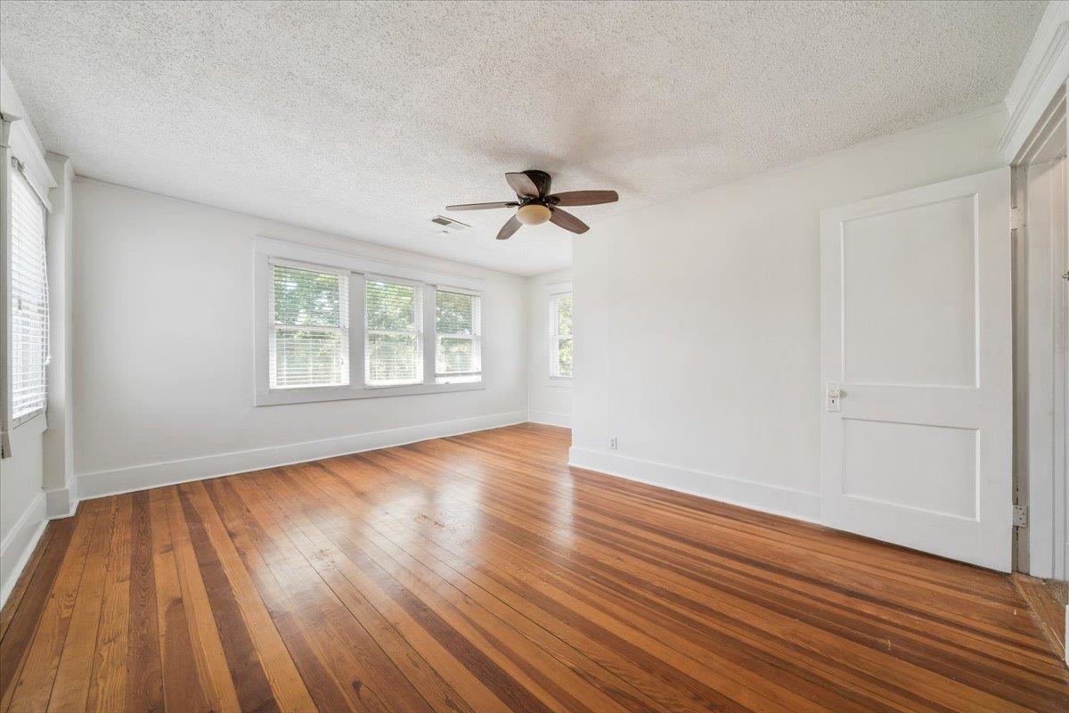 8703 Rosemark Road Millington, TN 38053 - Photo 23 of 38 wooden floor in an empty room with a window