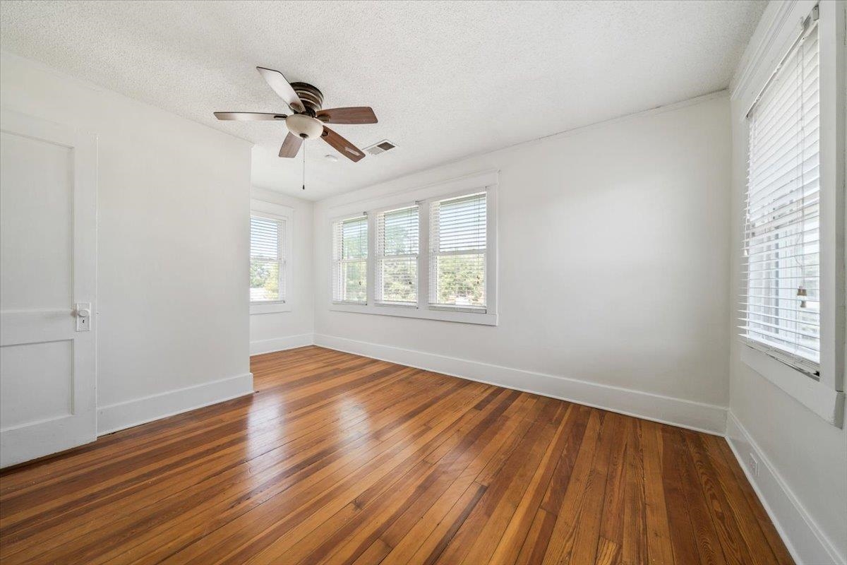 8703 Rosemark Road Millington, TN 38053 - Photo 25 of 38 wooden floor in an empty room with a window
