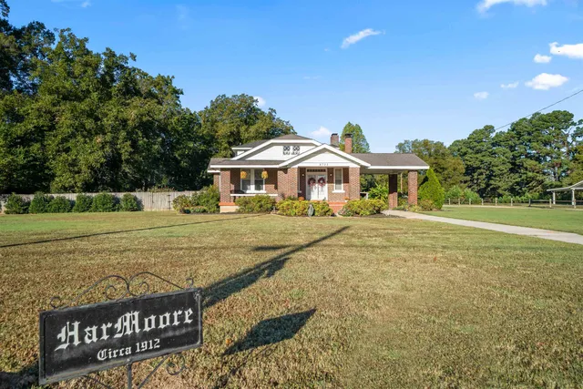 a front view of a building with garden