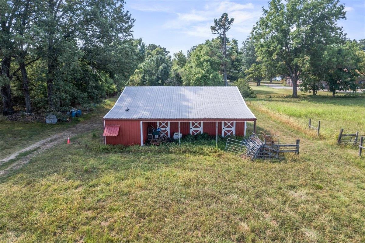 8703 Rosemark Road Millington, TN 38053 - Photo 7 of 38 a view of a house with a yard table and chairs