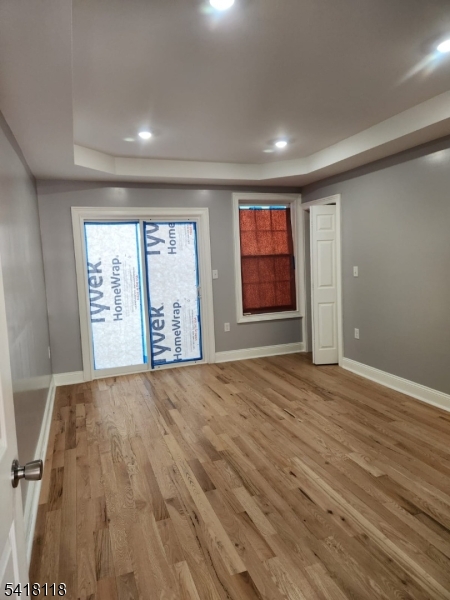 464 Walnut Street Elizabeth, NJ 07201 - Photo 14 of 22 an empty room with windows and closet