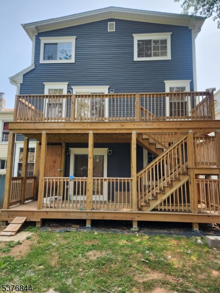 464 Walnut Street Elizabeth, NJ 07201 - Photo 4 of 22 a view of a house with pool in front of it