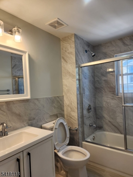 464 Walnut Street Elizabeth, NJ 07201 - Photo 7 of 22 a bathroom with a sink toilet and shower
