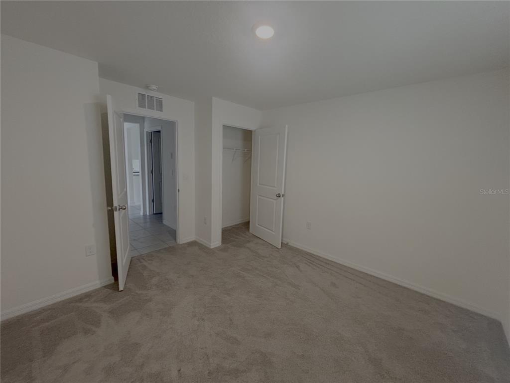 8940 Southwest 50th Terrace Ocala, FL 34476 - Photo 11 of 21 an empty room with closet area