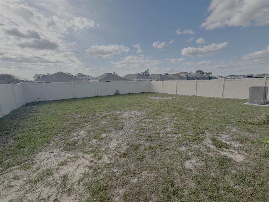 8940 Southwest 50th Terrace Ocala, FL 34476 - Photo 21 of 21 a view of a field with an ocean