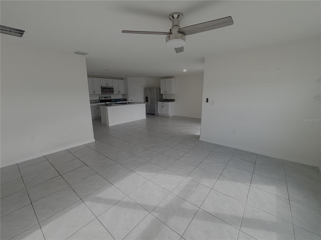 8940 Southwest 50th Terrace Ocala, FL 34476 - Photo 3 of 21 a view of a kitchen with a sink and cabinets