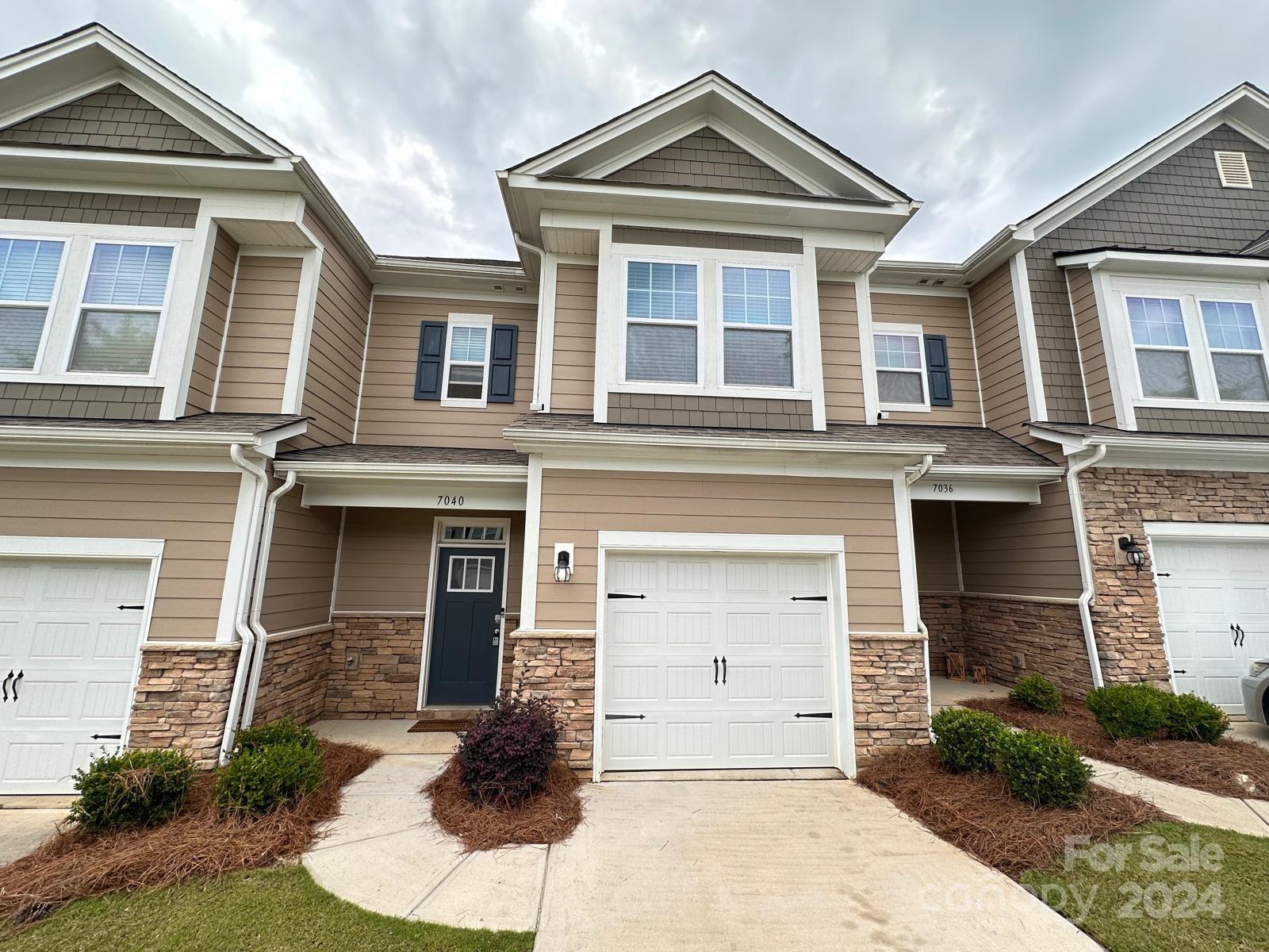 7040 Harris Bay Road Charlotte, NC 28269 - Photo 1 of 27 front view of a house