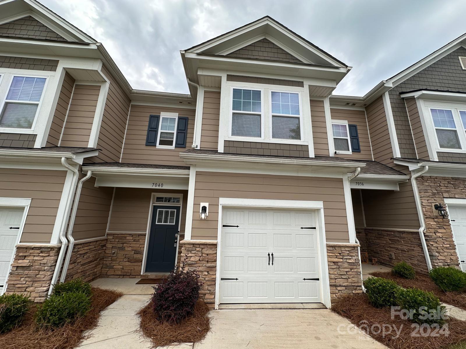 7040 Harris Bay Road Charlotte, NC 28269 - Photo 2 of 27 front view of a house