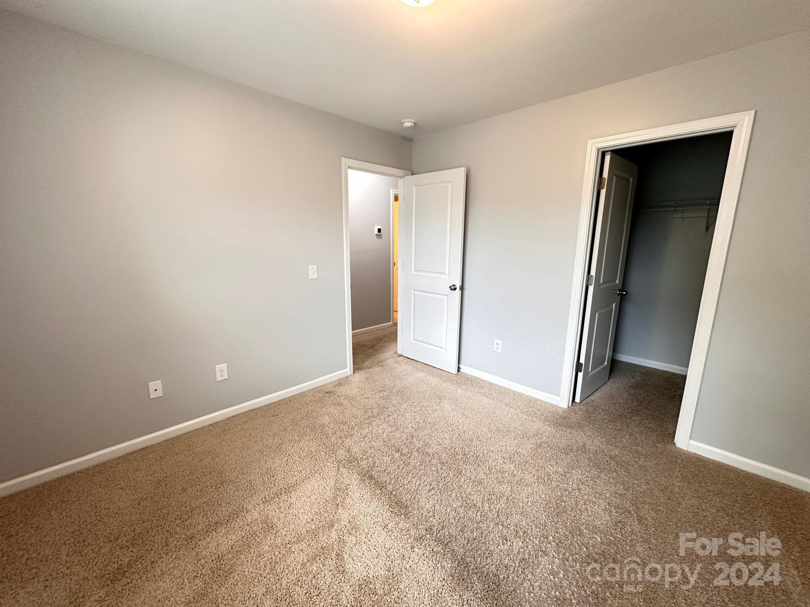 7040 Harris Bay Road Charlotte, NC 28269 - Photo 23 of 27 a view of an empty room