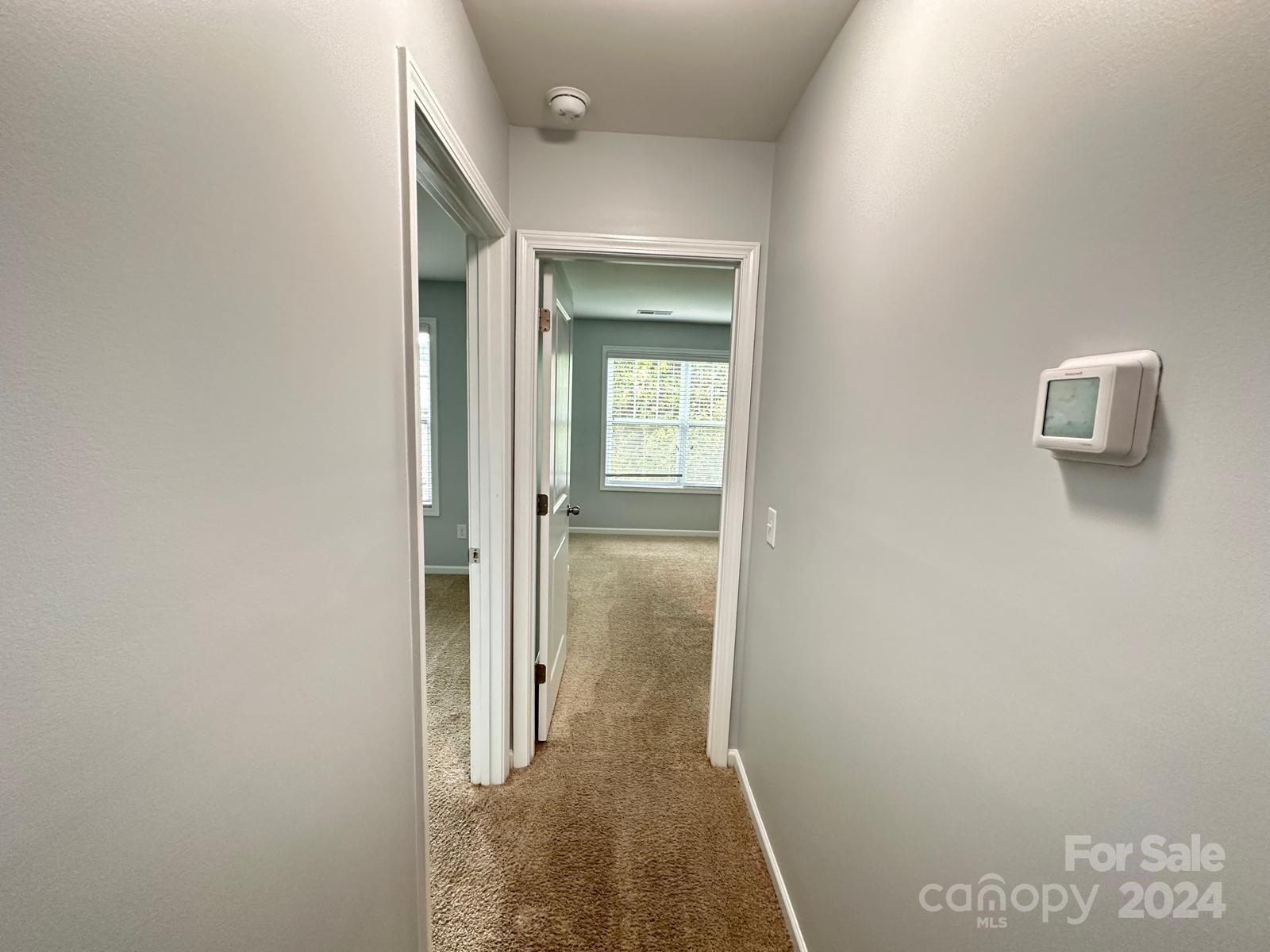 7040 Harris Bay Road Charlotte, NC 28269 - Photo 24 of 27 a view of a hallway