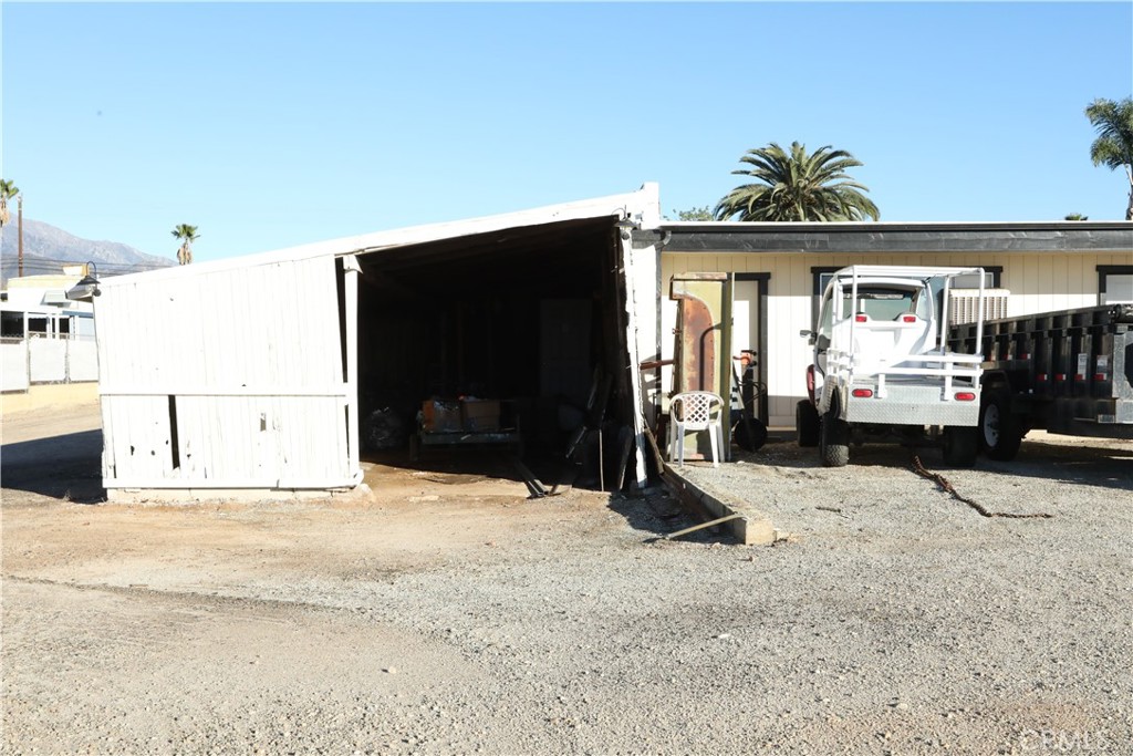 1002 California Street Calimesa, CA 92320 - Photo 13 of 14 a view of a house with a outdoor space
