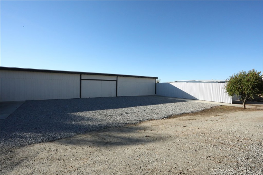 1002 California Street Calimesa, CA 92320 - Photo 9 of 14 a view of a garage