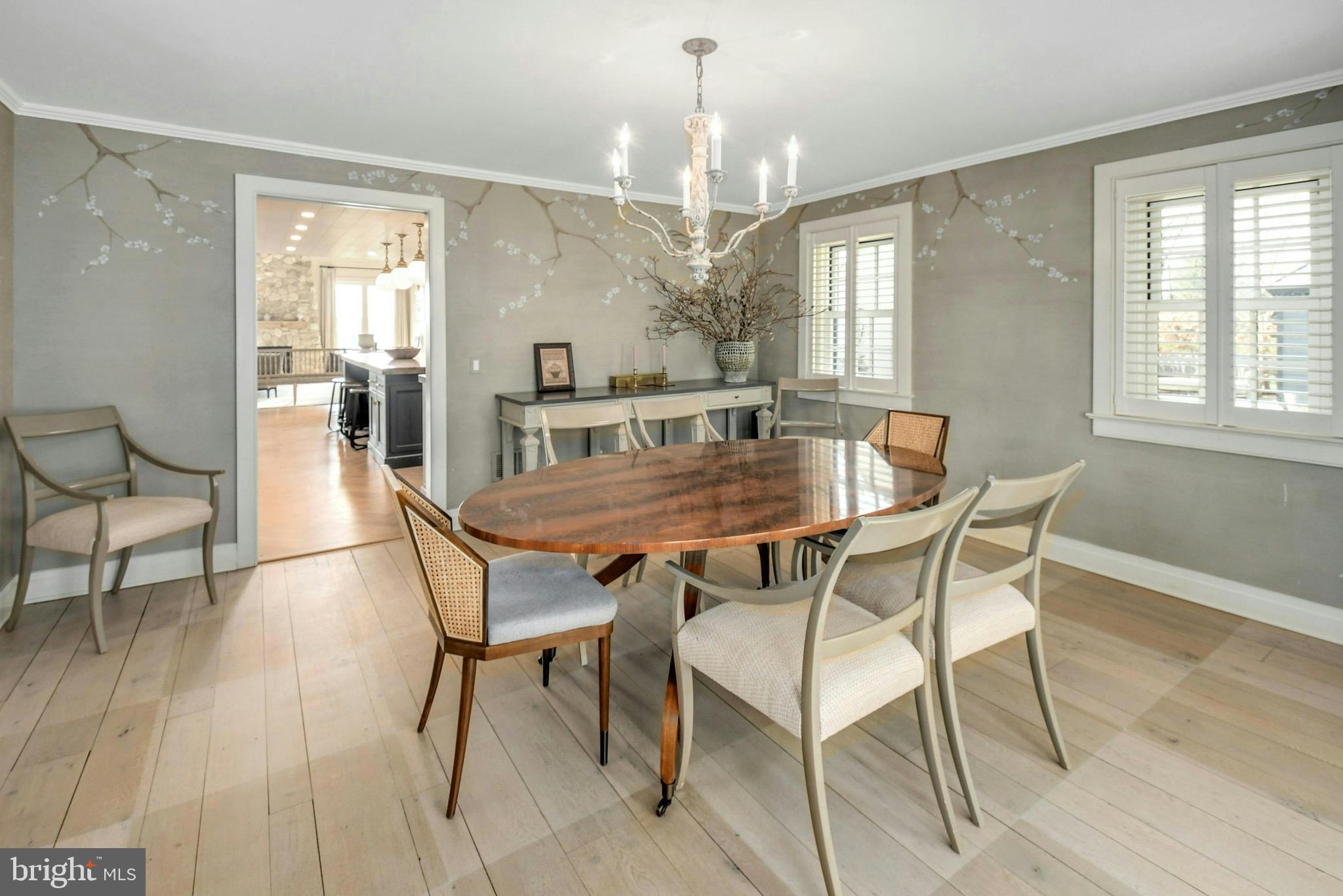 7043 Phillips Mill Road New Hope, PA 18938 - Photo 23 of 84 a dining room with furniture a chandelier and wooden floor