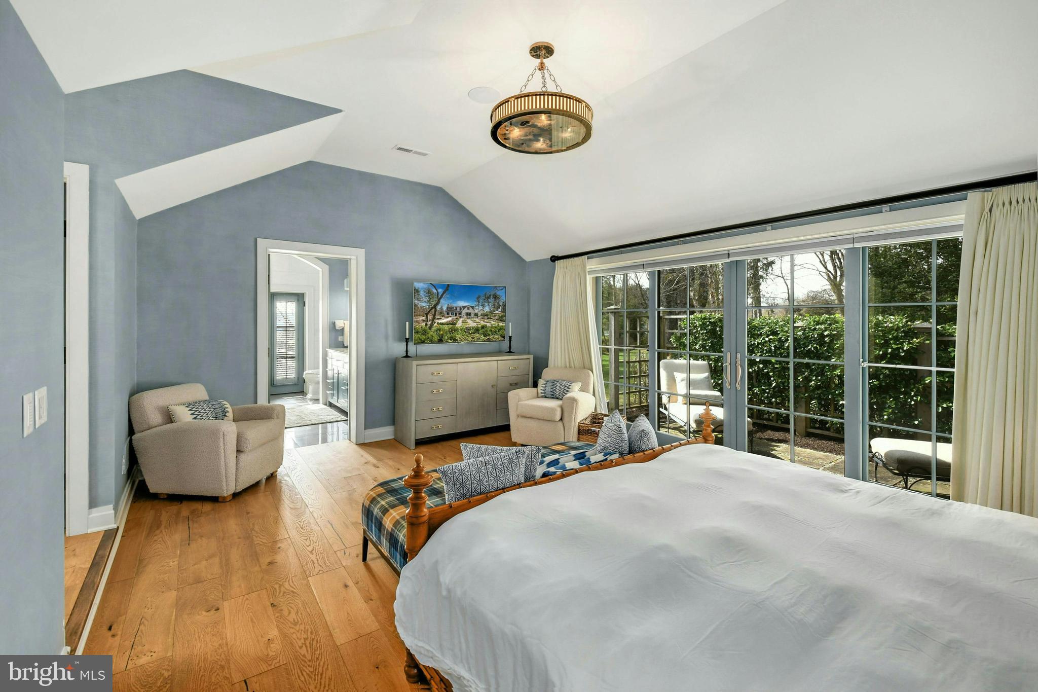 7043 Phillips Mill Road New Hope, PA 18938 - Photo 29 of 84 a bedroom with a bed and a large window