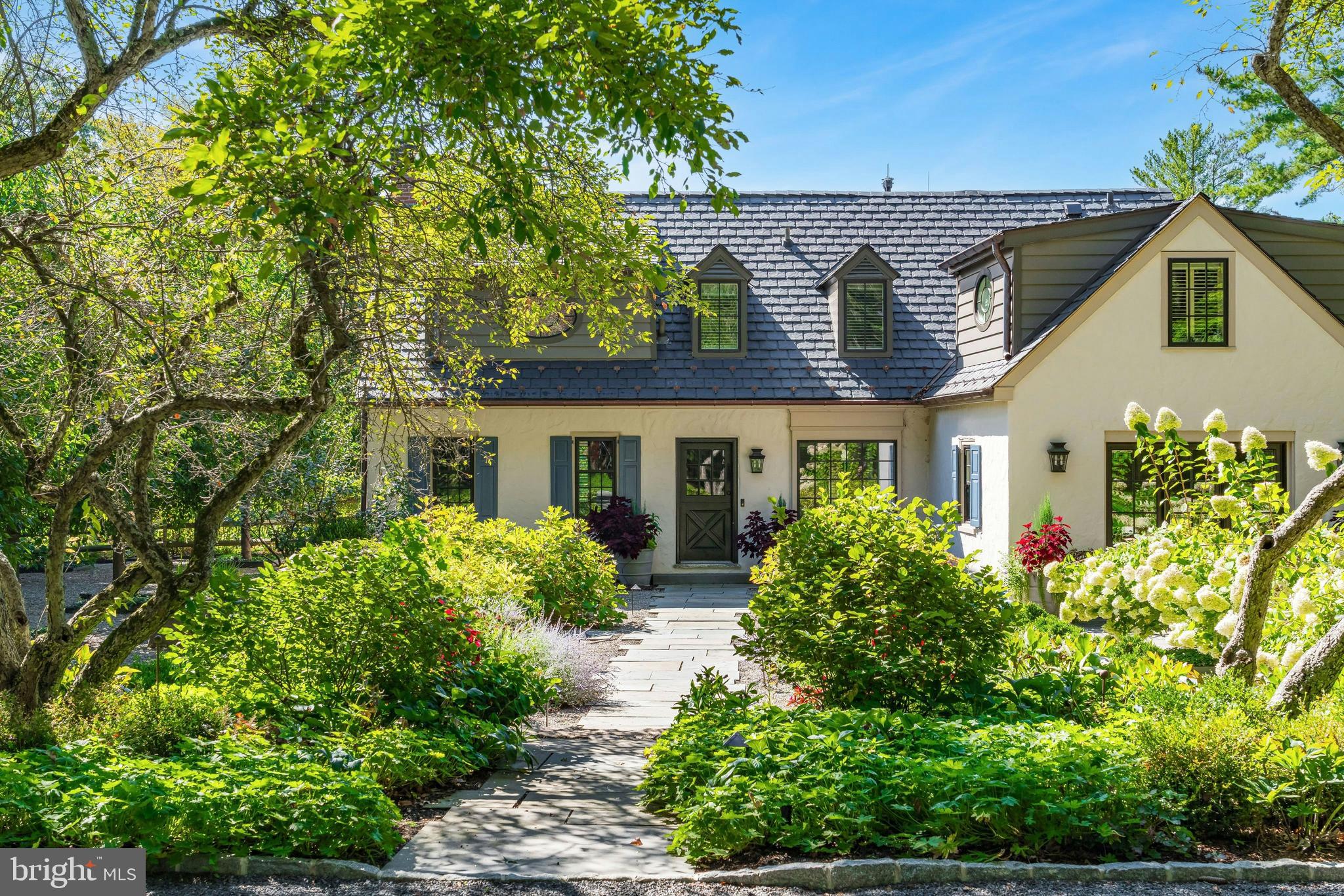 7043 Phillips Mill Road New Hope, PA 18938 - Photo 4 of 84 front view of a house with a yard
