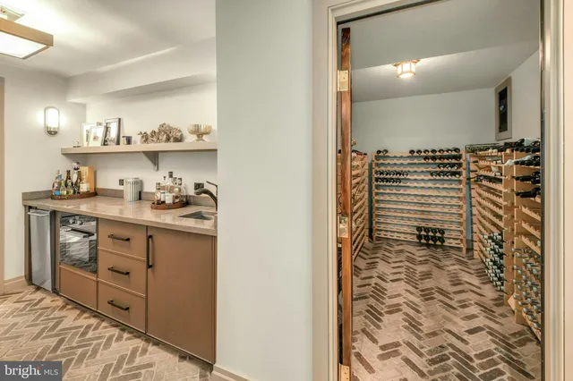 a view of a field with a trees in the background